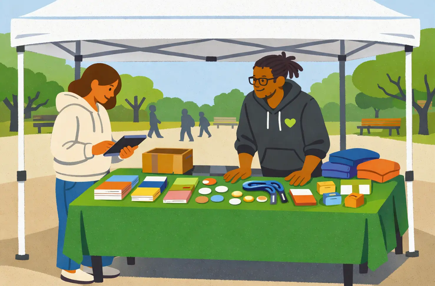 A man and woman at a table discuss technology solutions to help nonprofit organizations thrive.